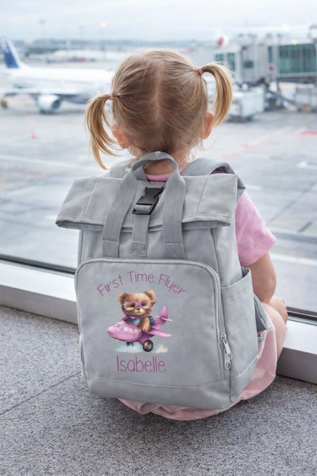 First Time Flyer personalised Mini Twin Handle Roll-Top Backpack pink design